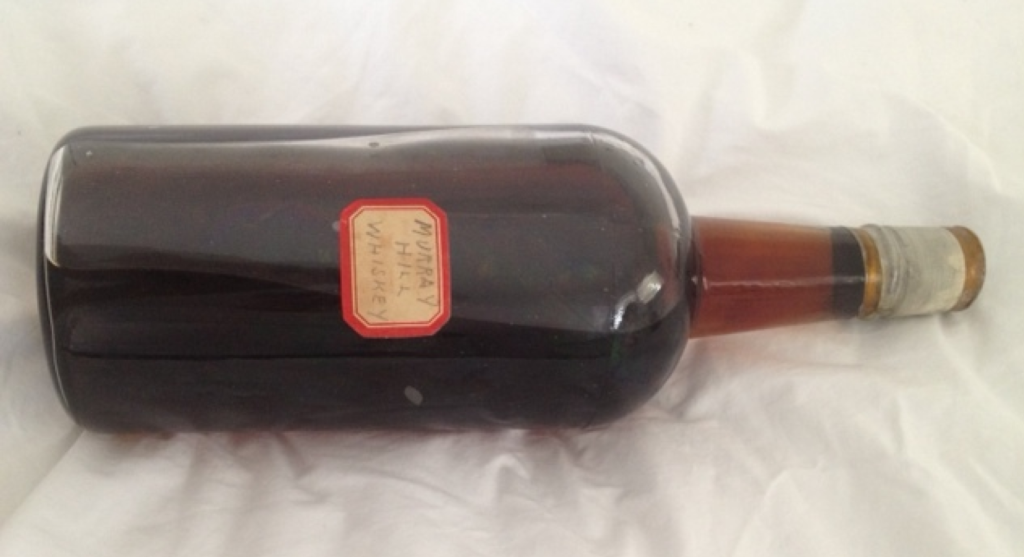 An original Murray Hill Club whiskey produced by Jos. A. Magnus & Co. 